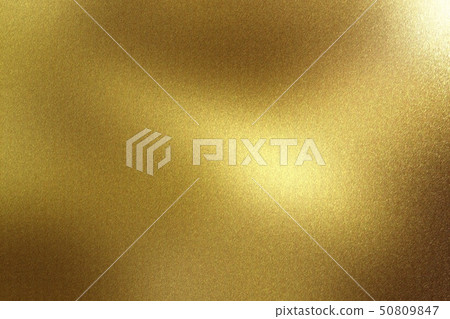 Glowing brushed gold metal wall surface, abstract Glowing brushed gold metal wall surface, abstract 50809847