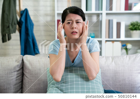 wife at home showing how much head hurts wife at home showing how much head hurts 50810144