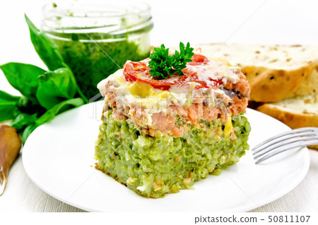 Casserole of salmon and rice on light board Casserole of salmon and rice on light board 50811107