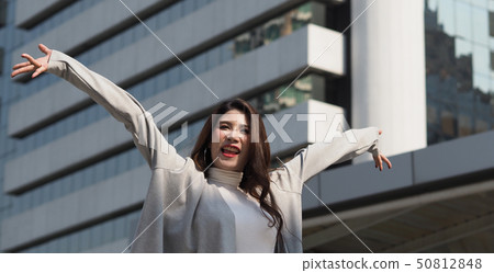Beautiful asian business woman happy and cheerful 50812848