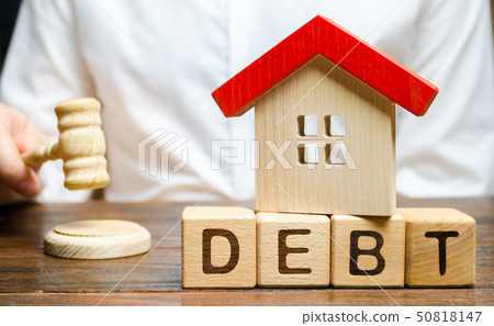 Wooden blocks with the word Debt  50818147