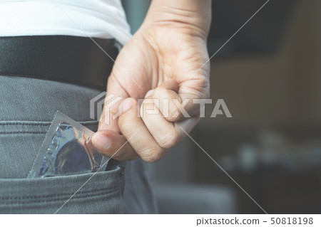 Condom man ready to use in Jeans pocket 50818198