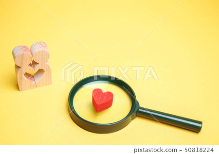 Heart, magnifying glass and a couple in love. Heart, magnifying glass and a couple in love. 50818224
