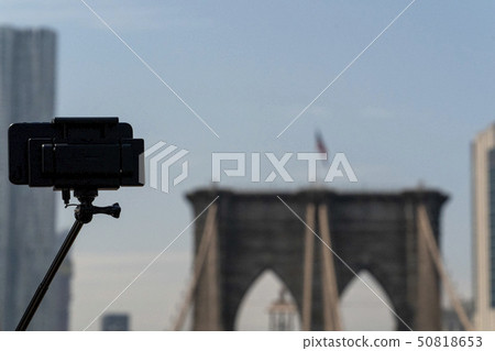 Selfie with smartphone and tripod on Brooklyn 50818653