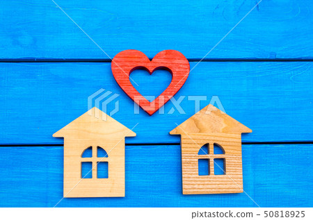 wooden houses and heart on a blue background wooden houses and heart on a blue background 50818925