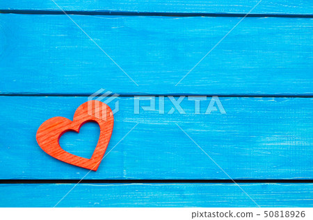red wooden heart on a blue background, Valentine's red wooden heart on a blue background, Valentine's 50818926