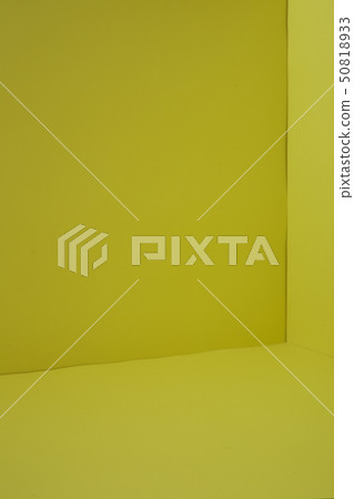 Empty corner yellow room with light from window 50818933