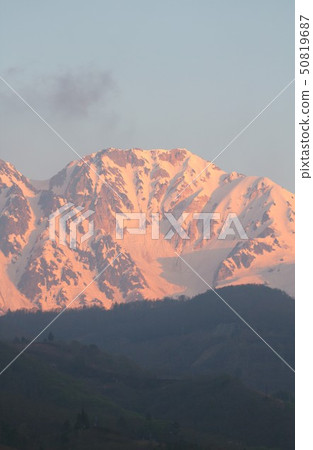 A view from Hakuba village on Mt. Ayako of Hokuba Hakusan Sanzan, which is dyed in the morning glow A view from Hakuba village on Mt. Ayako of Hokuba Hakusan Sanzan, which is dyed in the morning glow 50819687