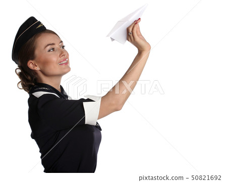 JUN 31, 2015 Air hostess in olf uniform of Russian airline Aeroflot Holding Paper Plane In Hand JUN 31, 2015 Air hostess in olf uniform of Russian airline Aeroflot Holding Paper Plane In Hand 50821692