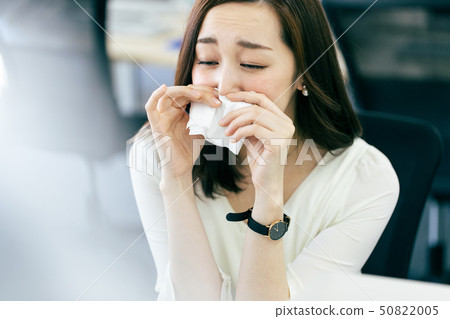 Cold cold hay fever runny woman office 50822005