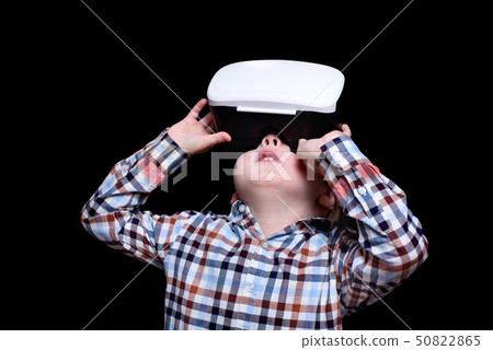 Little blond boy with glasses of virtual reality Little blond boy with glasses of virtual reality 50822865