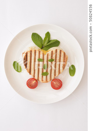 Heart shaped hot sandwich 50824556