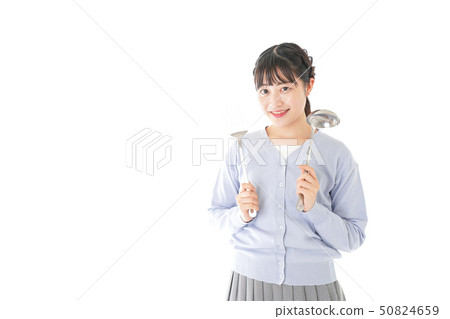 Young woman cooking Young woman cooking 50824659
