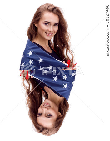 Happy young girl holding USA flag isolated on white background Happy young girl holding USA flag isolated on white background 50827466