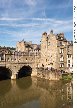Pulteney Bridge and Weir on the River Avon in the historic city of Bath in Somerset, England. Pulteney Bridge and Weir on the River Avon in the historic city of Bath in Somerset, England. 50827550