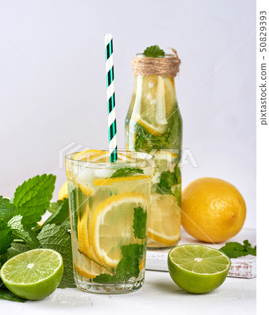 cold drink of fresh lemons, lime, mint green and cold drink of fresh lemons, lime, mint green and 50829393