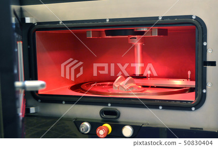 Object printed from metal powder on metal 3d printer, working chamber. Object printed from metal powder on metal 3d printer, working chamber. 50830404