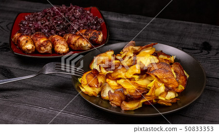 Fried homemade grilled sausages or chevapchichi Fried homemade grilled sausages or chevapchichi 50833353