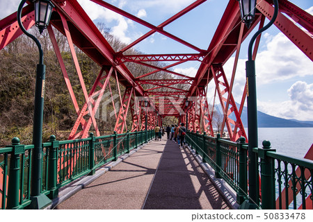 Hokkaido's oldest railway bridge in Lake Shikotsu Lake Tourists crossing the mountain line railway bridge Hokkaido's oldest railway bridge in Lake Shikotsu Lake Tourists crossing the mountain line railway bridge 50833478