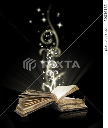 Open book magic on black  50836185