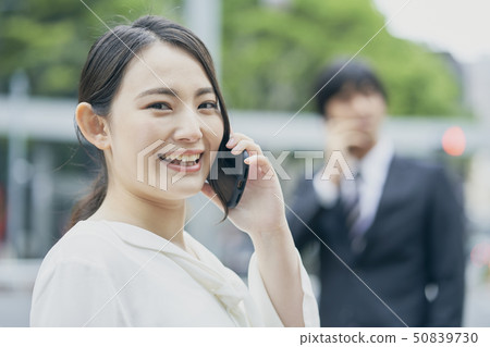 Business women smartphone 50839730