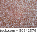 Stucco relief brown wall image. Relief texture 50842576