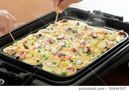 Takoyaki making on my hot plate Takoyaki making on my hot plate 50844197