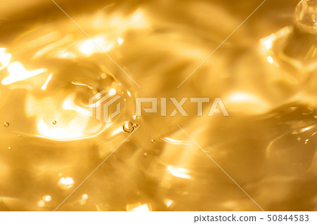 Water texture. Gold/Gold. Images of beauty, cosmetics, beauty, skin care, etc. 50844583