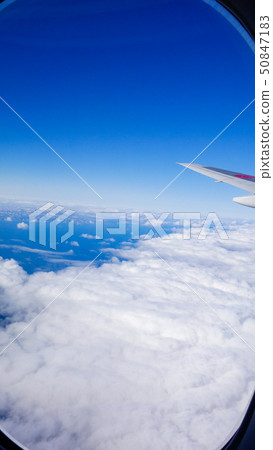 Sky seen from inside the plane Sky seen from inside the plane 50847183