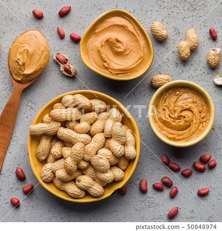 Bowls with peanut butter and peanuts Bowls with peanut butter and peanuts 50848974