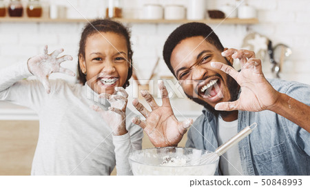 Funny cooking together concept 50848993