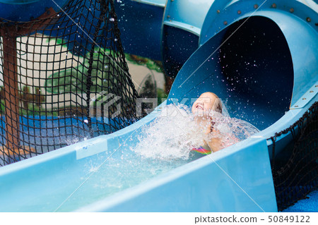 Kids at aqua park. Child in swimming pool. 50849122