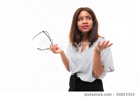 portrait of attractive young afro-american girl possing with glasses on background portrait of attractive young afro-american girl possing with glasses on background 50853303