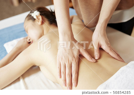 Low back massage 50854285