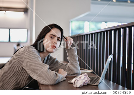 Business Concept. Young businesswomen are stressed 50854599