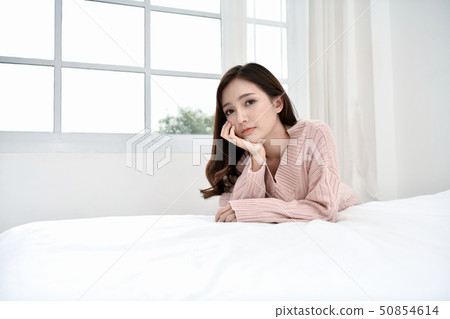 Relaxation concept. The beautiful girl is smiling Relaxation concept. The beautiful girl is smiling 50854614