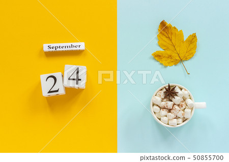 Autumn composition. Wooden calendar September 24, 50855700