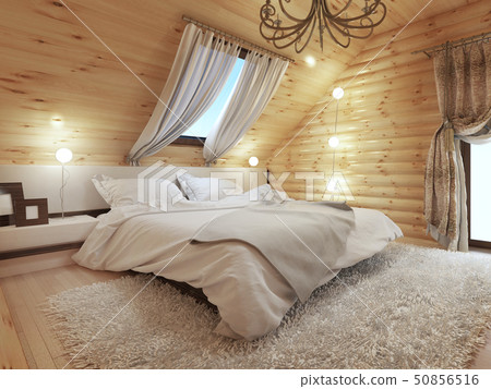 Bedroom interior in a log on the attic floor with 50856516