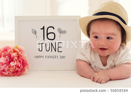 Father's Day massage with happy baby boy 50858584