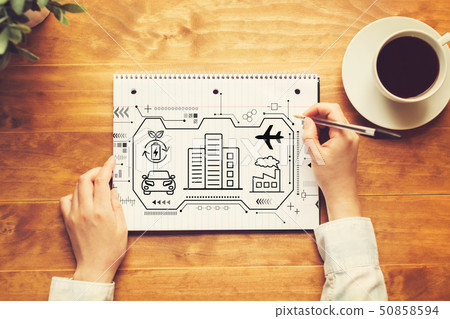 Smart city concept with a person writing in a notebook Smart city concept with a person writing in a notebook 50858594