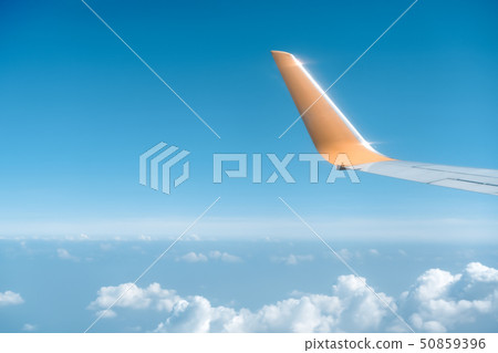 Top view on plane of Blue sky and plane wing. Top view on plane of Blue sky and plane wing. 50859396