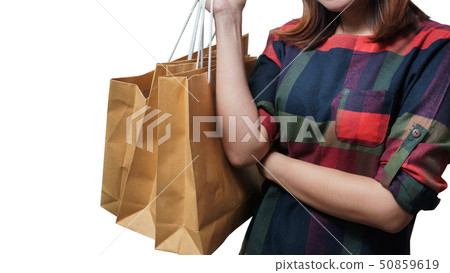 Shopping close up asian woman holding bags 50859619