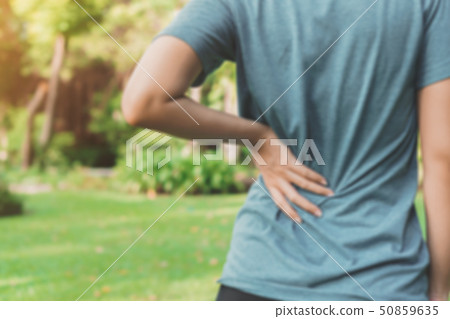 Young woman asian have accident back pain in sport Young woman asian have accident back pain in sport 50859635