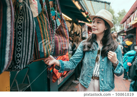 traveler shopping in mexico market on sunny day 50861819