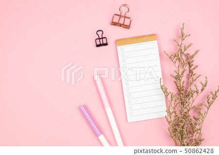 Top view of notebook stationery and flower Top view of notebook stationery and flower 50862428