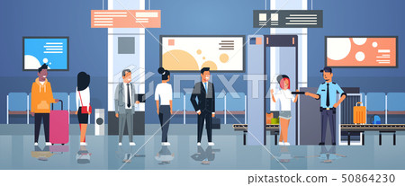 police officer checking passengers and luggage at metal detector x-ray gate full body scanner police officer checking passengers and luggage at metal detector x-ray gate full body scanner 50864230