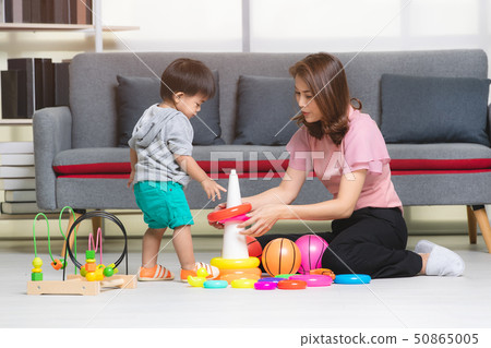 aSIAN FAMILY AT LEISURE aSIAN FAMILY AT LEISURE 50865005