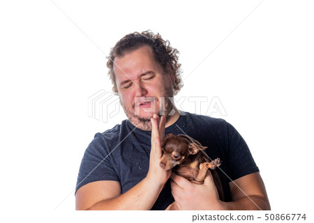 Funny fat man poses with little dog 50866774