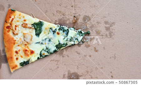 The last pieces of pizza in the box. The last pieces of pizza in the box. 50867305