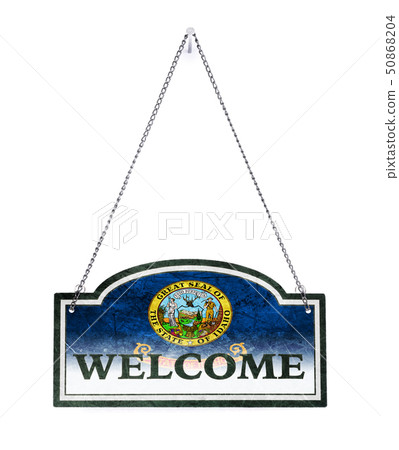 Idaho welcomes you! Old metal sign isolated Idaho welcomes you! Old metal sign isolated 50868204